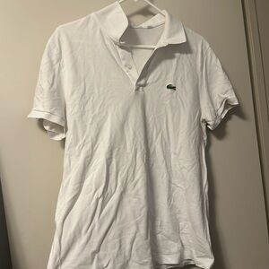 Lacoste collared shirt white. XL label but fits like medium. Barely worn :)